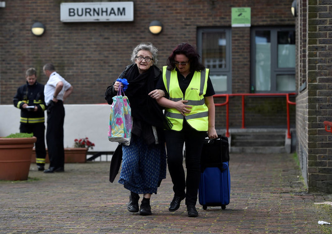 Hundreds evacuated from London towers 
as fire fallout widens