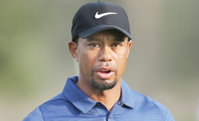 Tiger Woods released from program, to continue treatment