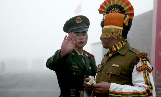 China holds live-fire drills in disputed Himalayan territory, tells India to withdraw