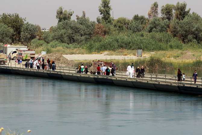 Iraqi bridge is sole link for Mosul residents rebuilding lives