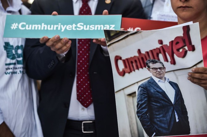 Turkish opposition journalists on trial for aiding ‘terror’