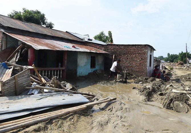 Flooding maroons people in Indian states, eases in Nepal