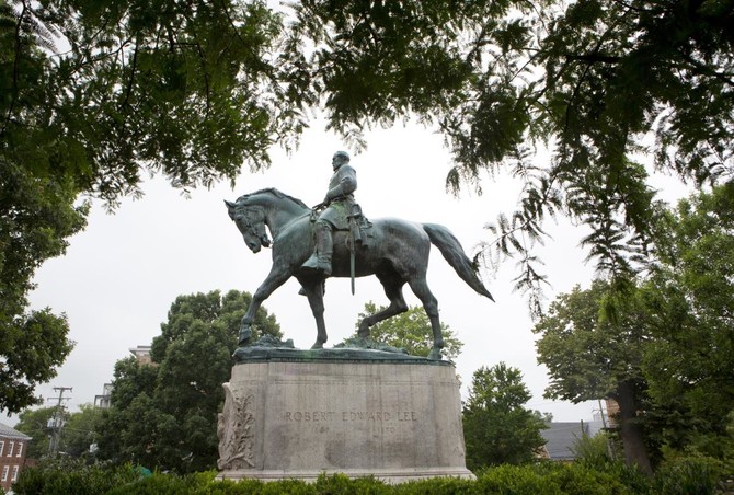 Charlottesville to cover Confederate statues after chaotic meeting