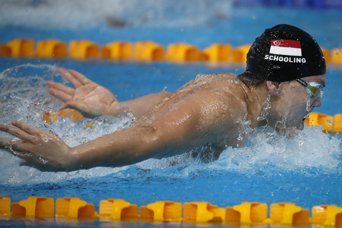 Singapore’s Schooling snaps up butterfly stroke gold