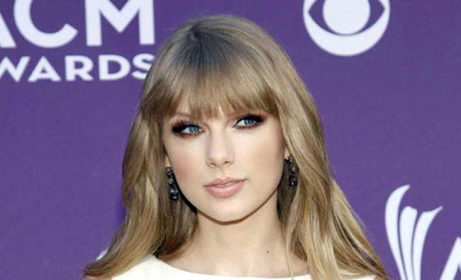 Taylor Swift sets records for Spotify streams, YouTube views