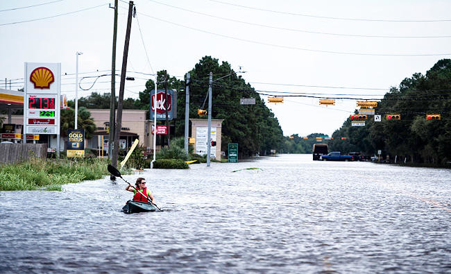 Rescuers in Texas intensify efforts as Harvey moves offshore