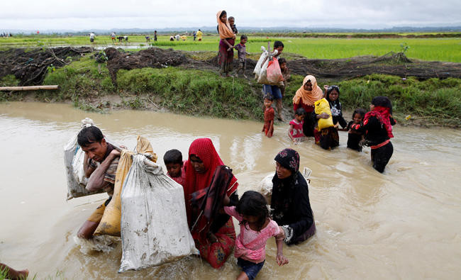 Myanmar death toll surges as 38,000 Rohingya flee to Bangladesh