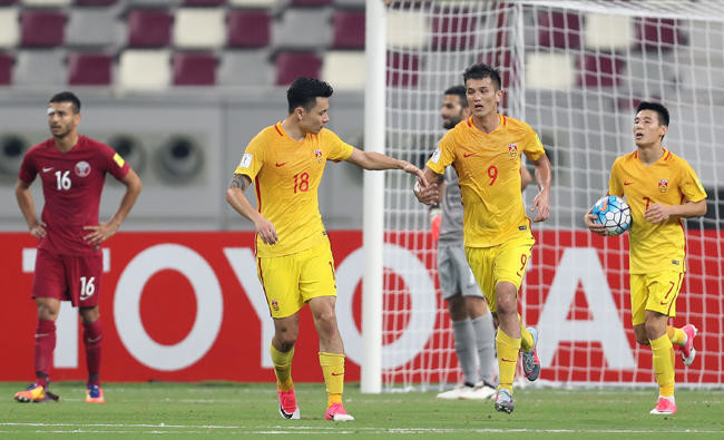 China out of World Cup despite victory over Qatar