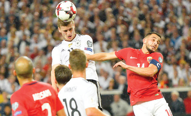 Germany, England close in on World Cup qualification