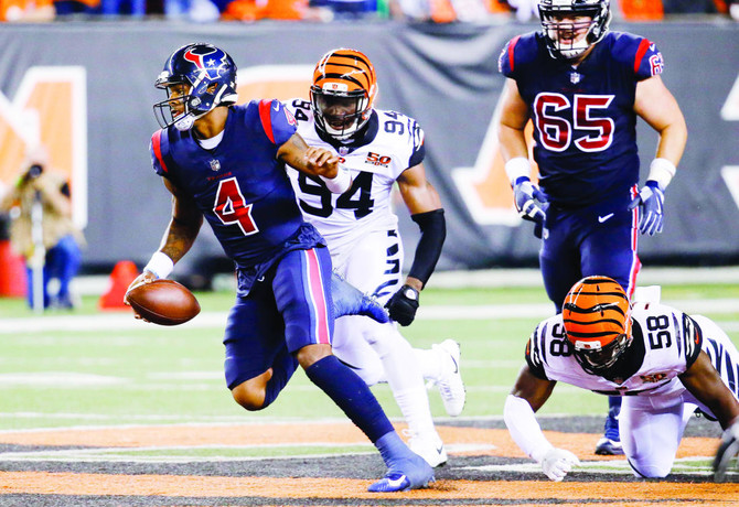 Watson leads Texans over Bengals, 13-9, in debut