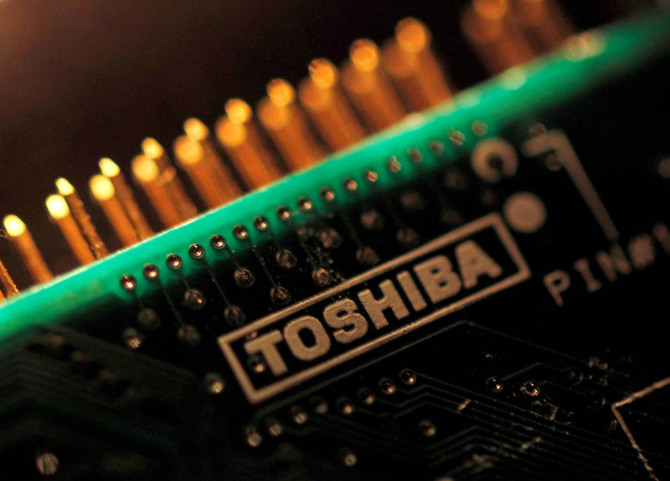 Toshiba, keen to seal $18 billion chips sale, wrestles with last-minute delays