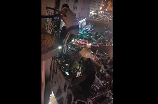 VIDEO: ‘Suicidal’ man pulled to safety from balcony by rescue workers