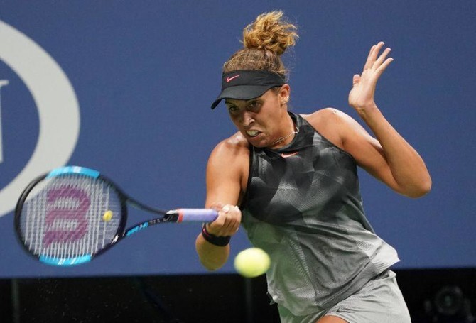 Injury-hampered Keys out in Wuhan first round