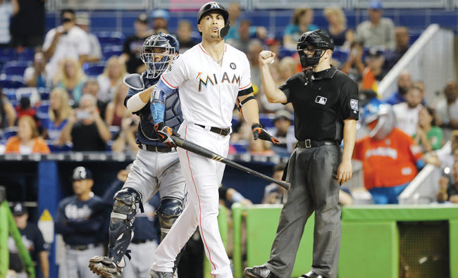 Giancarlo Stanton homers twice to reach 59, Marlins top Braves