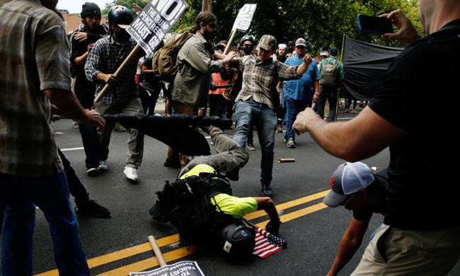 White nationalists return to Charlottesville for torch-lit protest