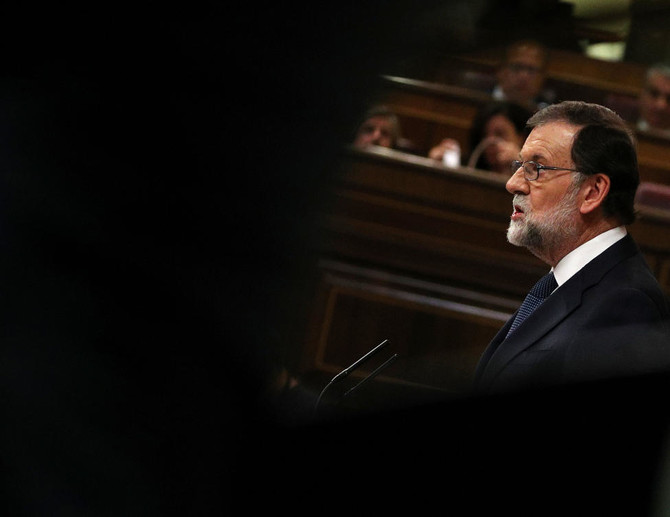 Spain gives Catalan leader 8 days to drop independence