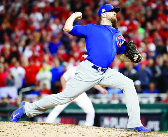 Davis saves day as Cubs reach NLCS | Arab News