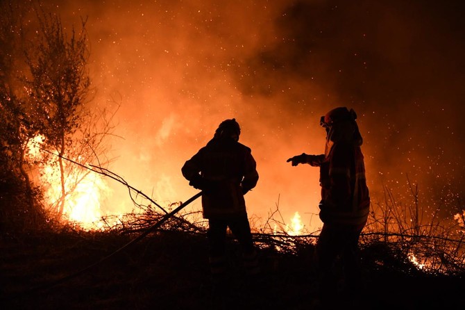 Wildfires kill 39 in Portugal and Spain