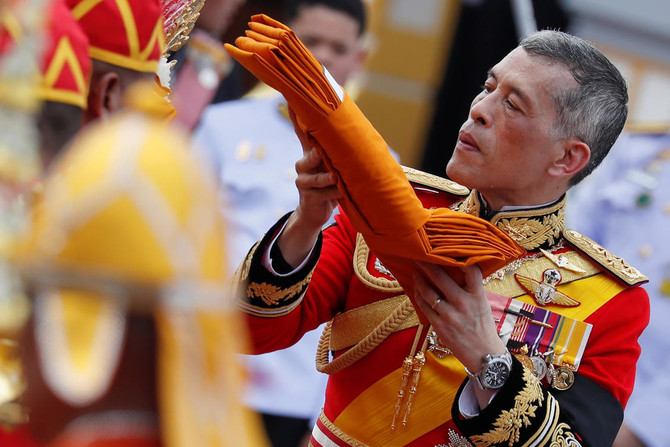 Remains of late Thai king collected after night of tears and ancient funeral rites