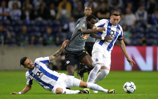 Porto beats Leipzig 3-1 to move 2nd in CL group