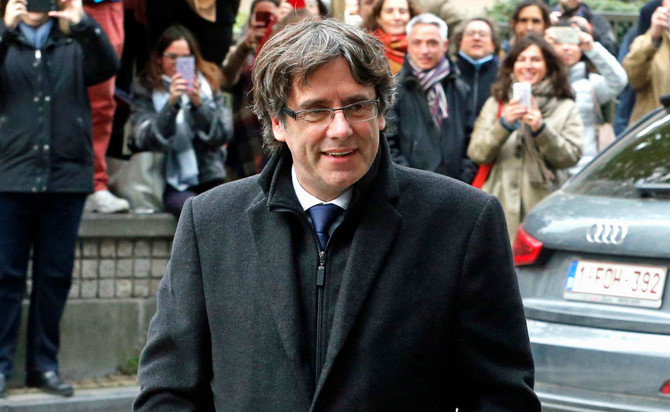 Puigdemont turns himself in to Belgian police