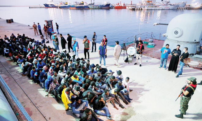 Libyan coast guard intercepts packed migrant boat