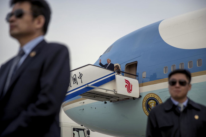 Trump lands in China for talks on trade, North Korea