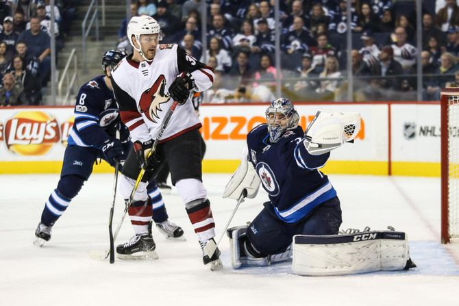 Hellebuyck’s 32 Saves Lead Jets Over Coyotes 4-1 | Arab News