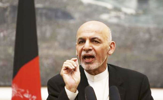 Afghan president apologizes for scarf remark