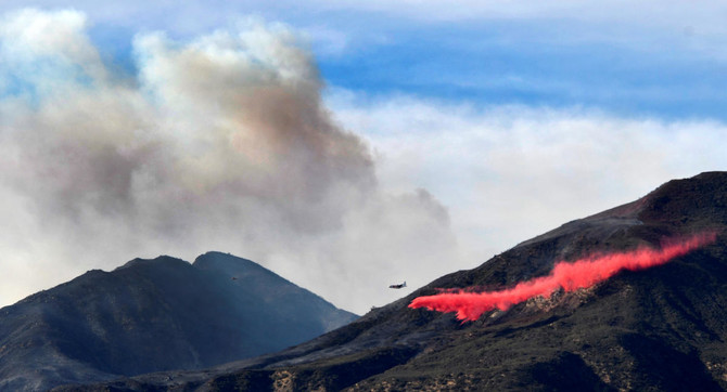 Firefighters race to contain California wildfires as winds set to strengthen