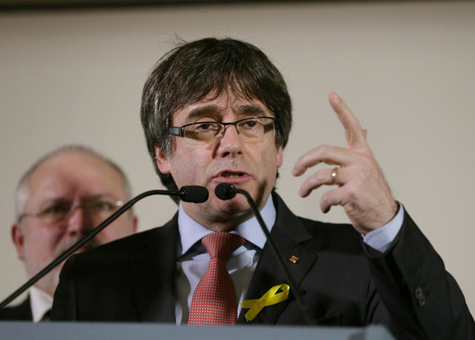 Catalan separatists agree to re-elect ousted president Puigdemont