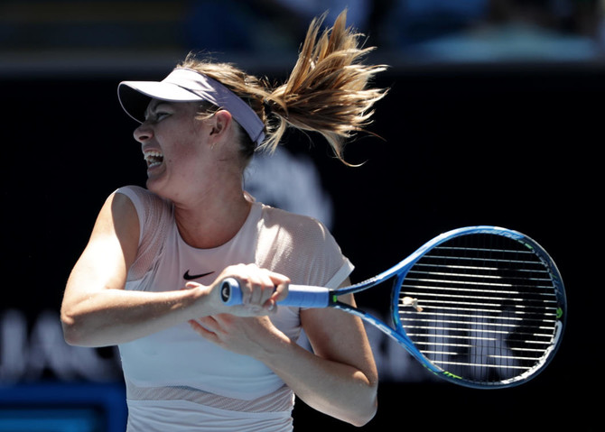 Unseeded Sharapova sails into Open second round