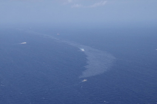 Iranian oil tanker wreck produces 2 slicks in East China Sea