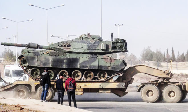 Turkish forces converge on Syria border; attack on Afrin imminent