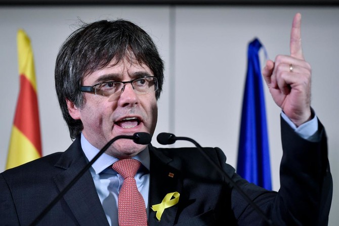 Spain wants exiled ex-Catalan leader arrested if he travels to Denmark