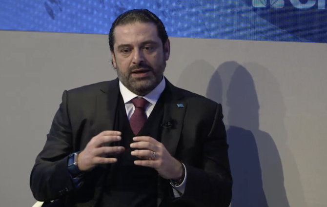 Hariri goes on charm offensive in Davos