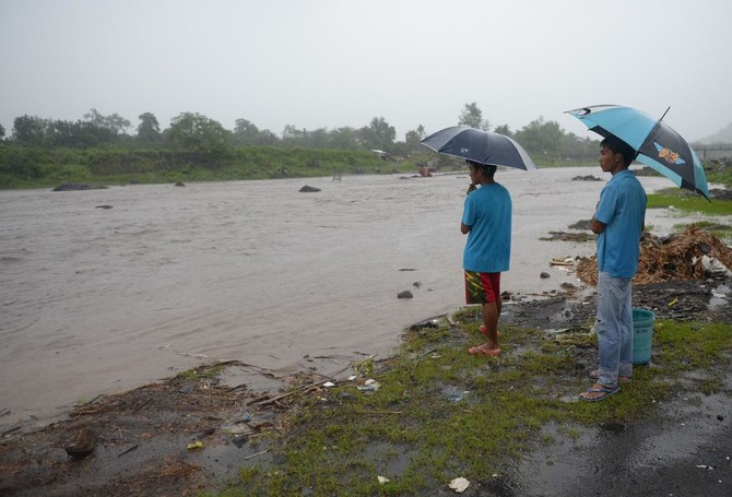 Deadly mudflows threaten residents near erupting Philippine volcano