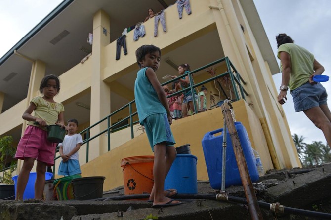 Residents fleeing Philippines’ Mayon volcano stretching relief camps