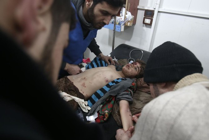 Syria raids kill nearly 30, as war of words escalates over chlorine use