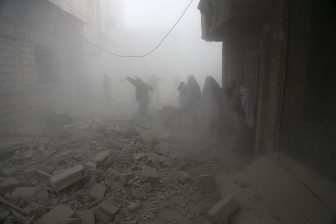 Regime and allies continue to pound Damascus's Ghouta a day after gas attacks