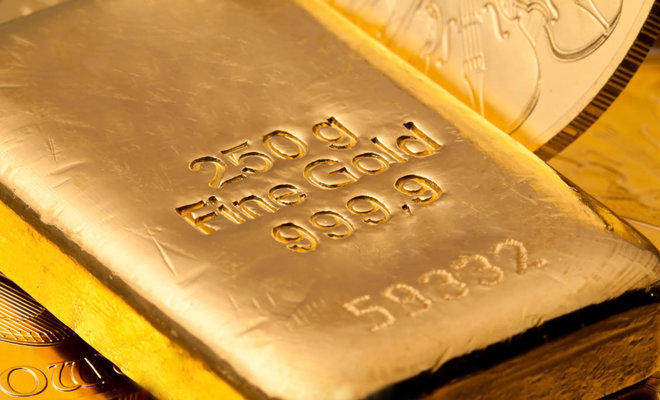 Gold dips, heads for second weekly loss