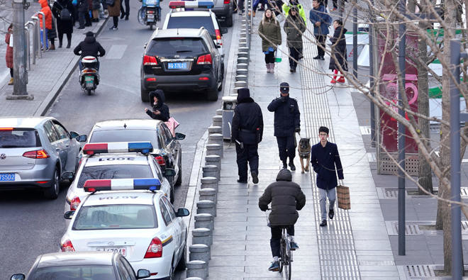 Woman killed, 12 injured in Beijing mall knife attack