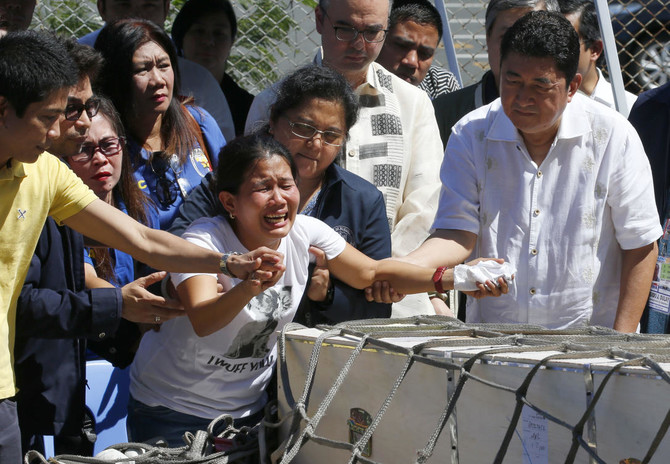 Family grieves Philippine maid found dead in Kuwait freezer