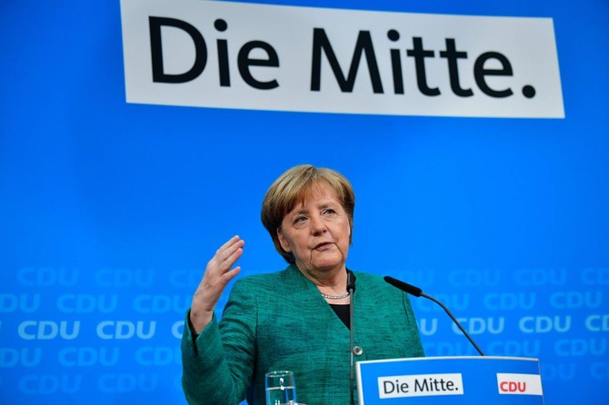 Merkel quells party rebellion ahead of Germany coalition deal vote