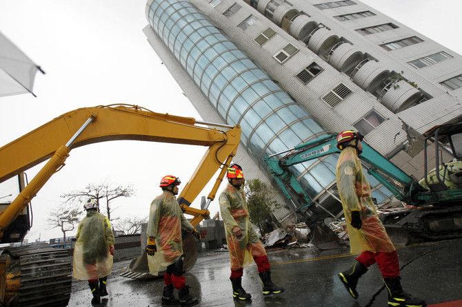 Taiwan detains developer of building where quake killed 14