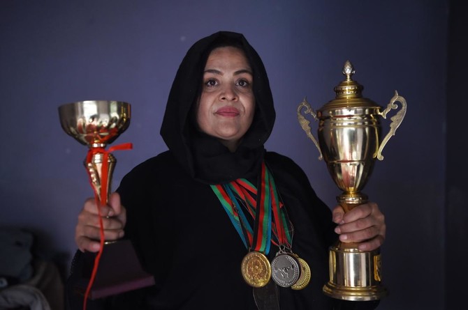 Afghan women power-lifters flex their muscles