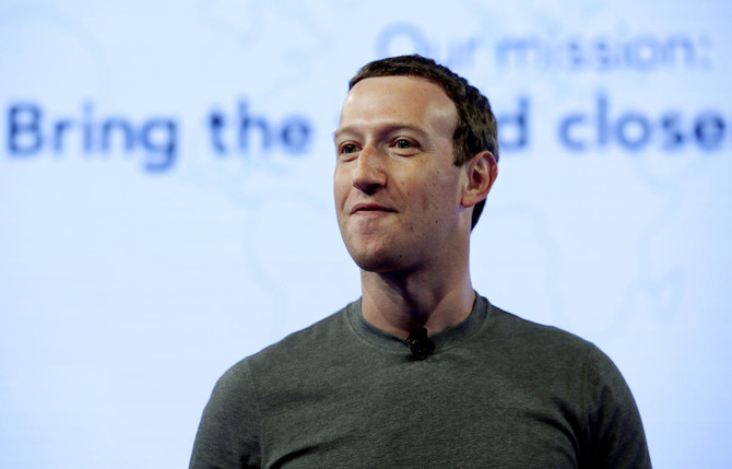 As Facebook scandal mushrooms, Zuckerberg vows to ‘step up’