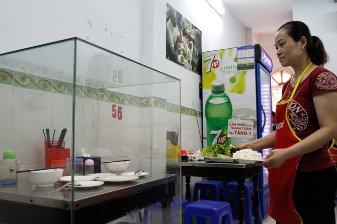 Eternal noodles Obama bun cha table encased in Vietnam Arab News