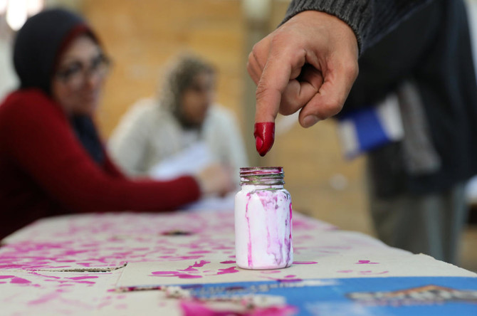  Egypt votes on final day, with all eyes on turnout