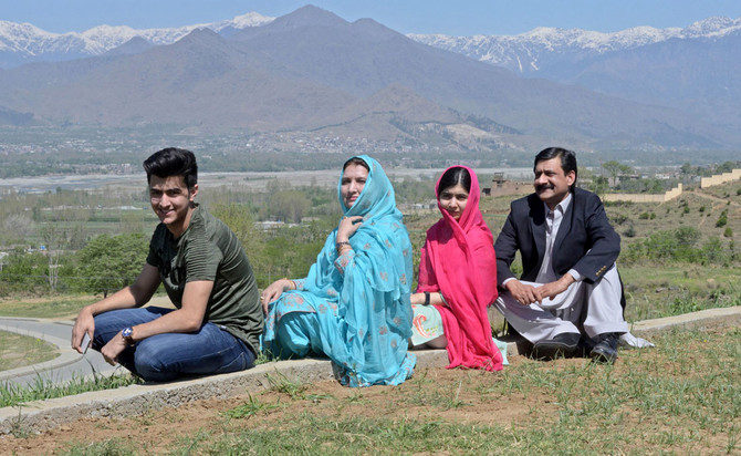 'Back with eyes open': Malala visits Pakistan district where she was shot